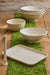 Vassoio riutilizzabile in composito beige "Huskly" - 31 cm x 22,6 cm x 1,6 cm - 30 unità